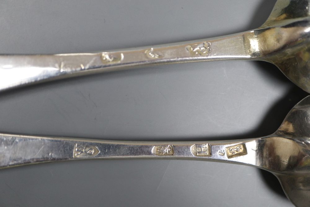 Two early 18th century silver Hanovarian rat tail pattern table spoons,